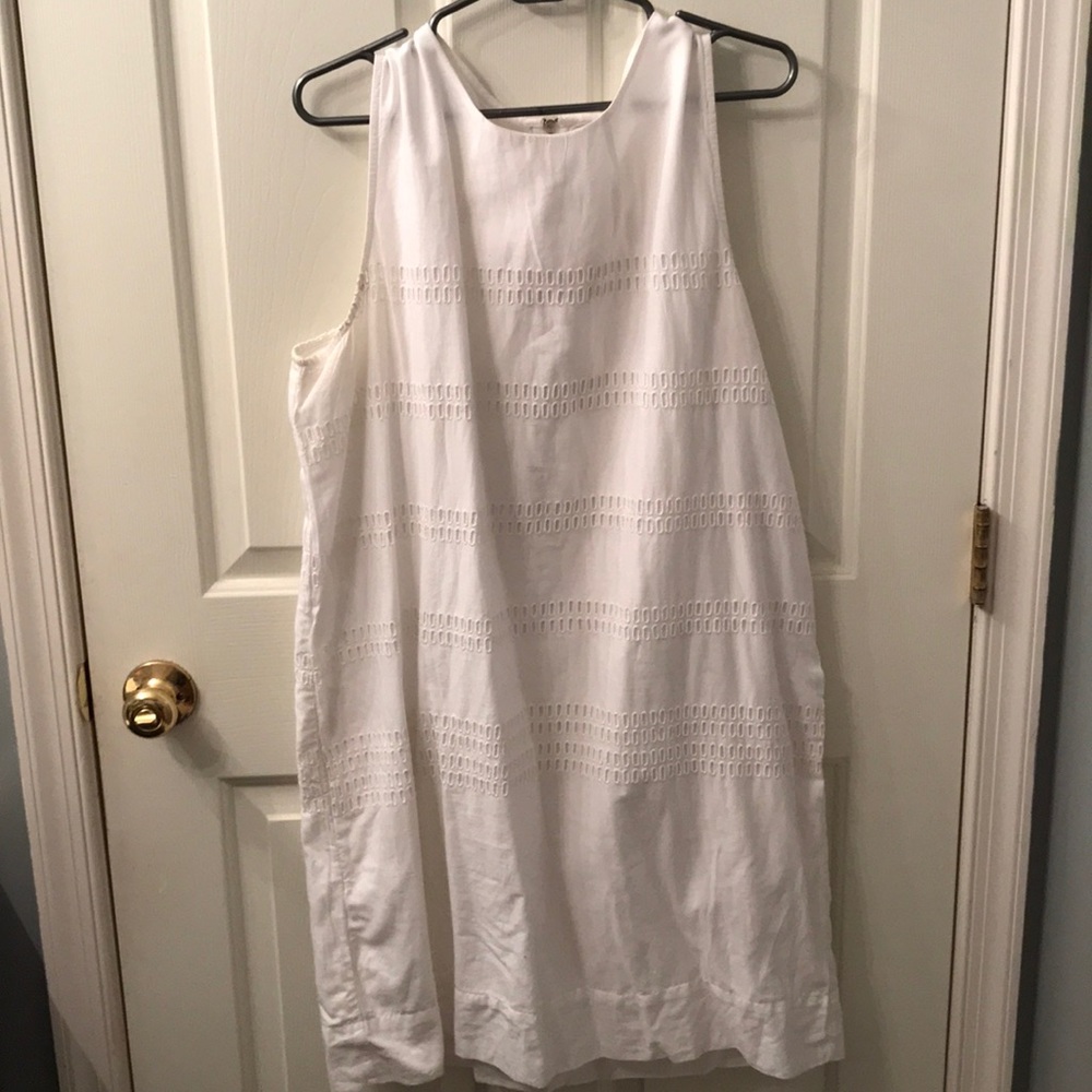 White dress with eyelet holes
